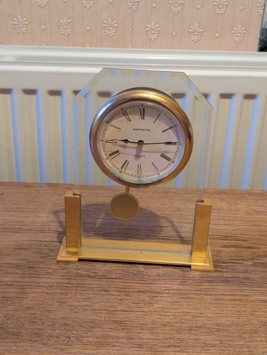 Infinite brass glass mantel - glass,