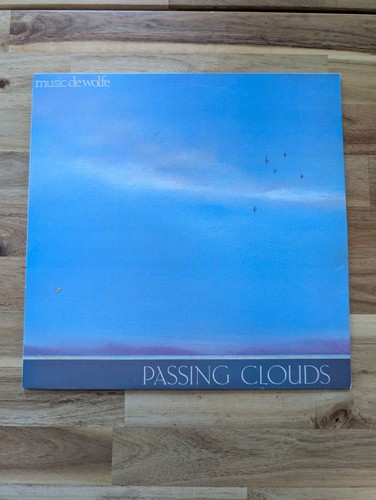 Sue biggs passing clouds - biggs,