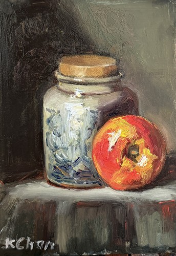 Red apple and mustard jar - and,