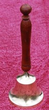 Brass counter bell with turned wood handle. Bell 3 inches across at base
