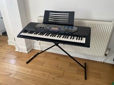 Casio CTK-571 Portable Keyboard, With Stand In Mint Condition and not used.