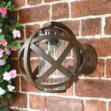 The Carmen Wall Lantern Finished in Rustic Iron