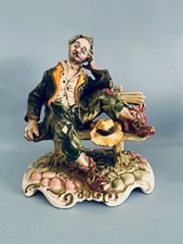 Capodimonte Tramp on Bench