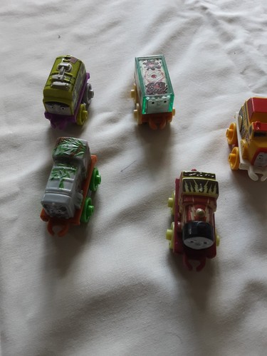 Five miniature thomas etc - five,