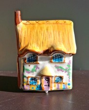 Toni Raymond Money Box Cottage
