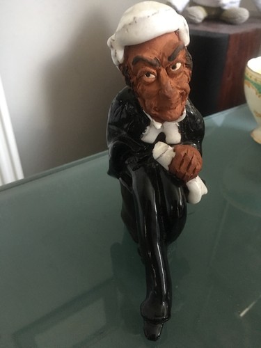Chelsea pottery judge figurine