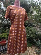 Toast tan cotton dress, with sky blue and yoke squares. Size 12
