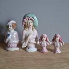 SMALL LOT OF PORCELAIN HALF DOLLS.