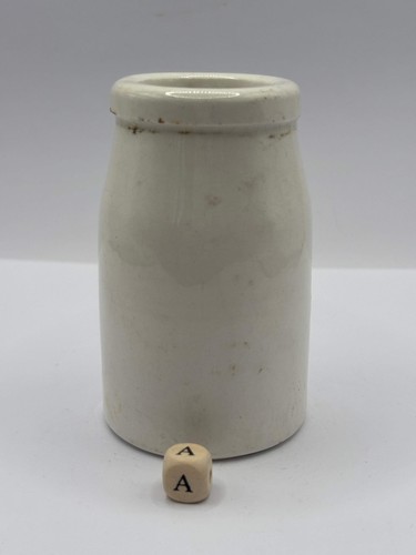Old white stoneware jar