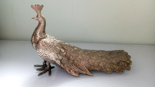 Silvertone metal figurine - silvertone,
