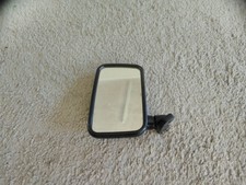 One universal black o/s door mirror (Suzuki)
