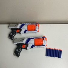 Two Nerf N-Strike Elite Strongarm Blasters + Darts Revolver Action