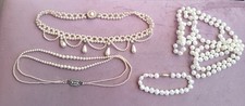 ANTIQUE PEARL NECKLACES TWO WITH SILVER CLASPS.