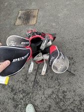 Set Of Clubs - Dunlop, Will Need A Clean! Comes In A Golf Bag + Balls As Well.