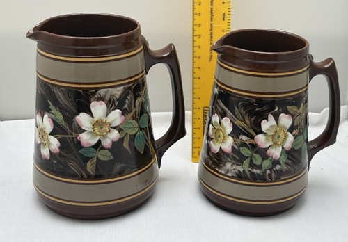 Pair antique pottery - a,