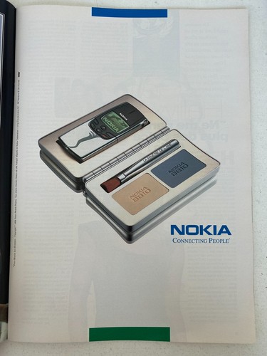 Vintage advertising phone - ◕,