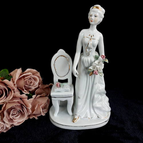 Porcelain figurine lady with - porcelain,