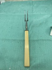 Vintage 10” Bakelite meat fork with finger Guard,  butterscotch handle, 1940