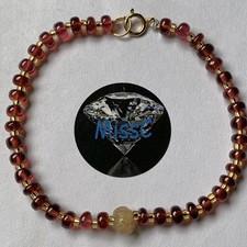 9CT GOLD MOZAMBIQUE GARNET and YELLOW SAPPHIRE PUMPKIN BRACELET, NATURAL STONES