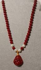BURGUNDY JADE SITTING BUDDHA
