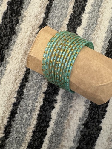 Green and gold glass bangles - and,
