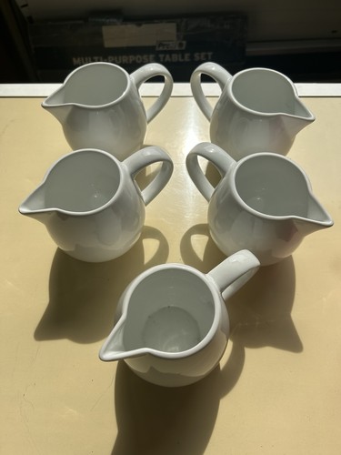 Mini ceramic milk jug - x,