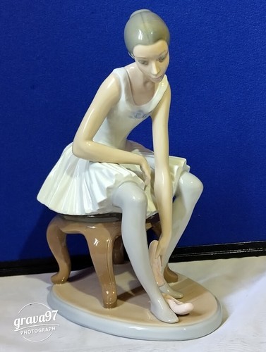 Nao lladro figurine - by,