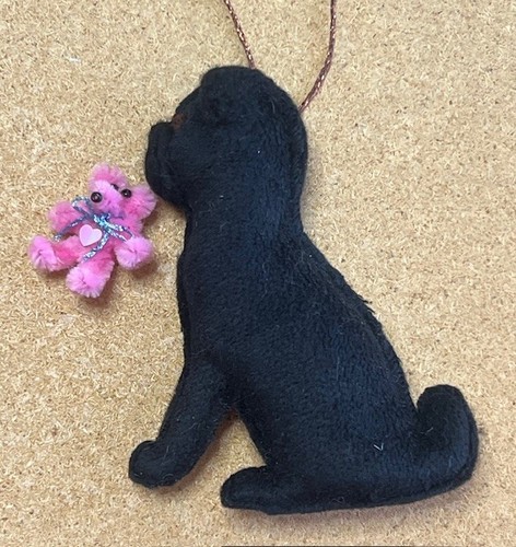 Black pug with - with, pink