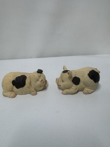 Pair pig figurines black - of,