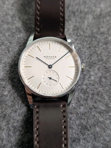 Nomos orion glass back - orion,
