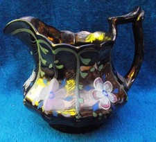 A very fine Victorian Handpainted Copper Lustre Jug
