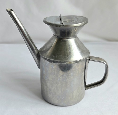 Silver coloured metal oil jug - oil,