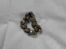 ANTIQUE STRING of PRESSED