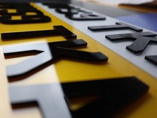 PAIR OF 4D NUMBER PLATES ROAD
