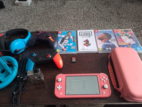 Nintendo switch lite coral - nintendo,