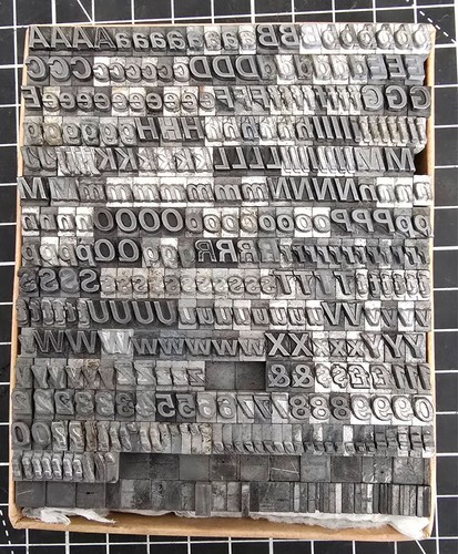 18pt univers italic - italic, metal