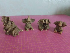 Set Of 4 Elephant Figurines