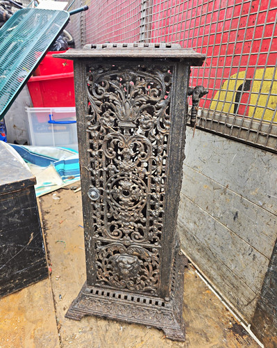 Ornate black cast iron heating - cast,