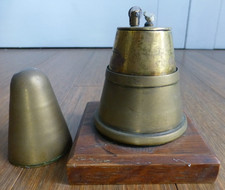 Trench art table lighter from fuse protectors - nicely made.