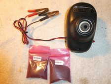 SPARK PLUG CLEANER , 12VOLT POWERED , USED CONDITION, WITH TWO NEW GRIT PACKS.