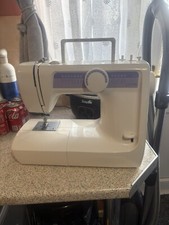 sewing machine used working