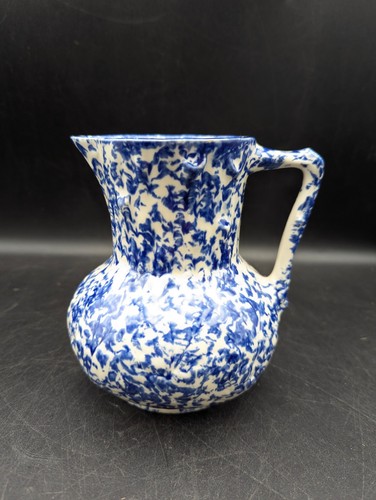 Blue white sponge ware with - &,