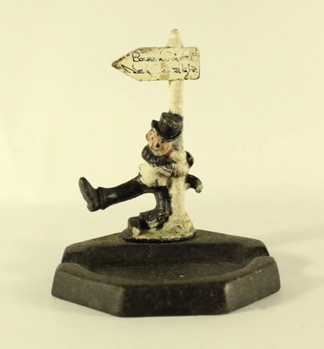 Vintage cast iron drunk - man, on