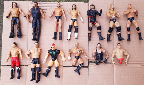 Damaged wrestling figures - damaged,