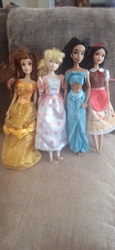 Four disney dolls good clean - ,