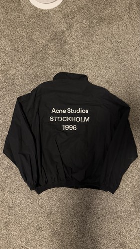 Acne studious washed - studious, logo