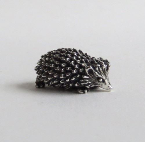 Hedgehog walking figurine