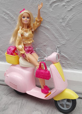 BARBIE DOLL WITH PINK MOPED