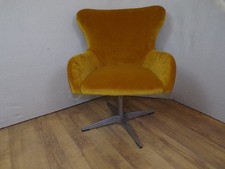 Fully Re-upholstered  swivel arm chair