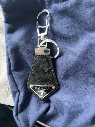 Prada triangle logo - triangle,